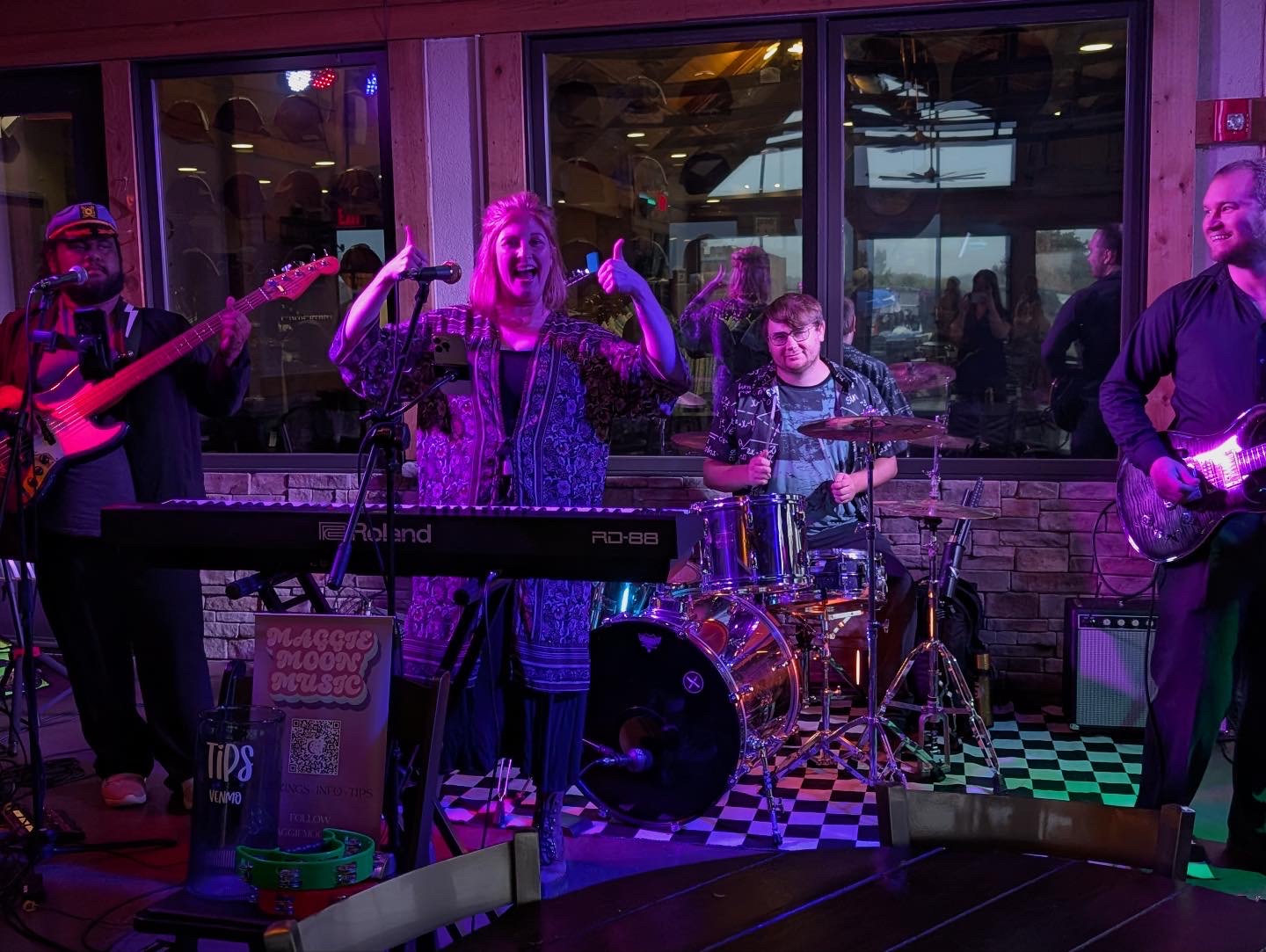 Maggie Moon performing with the Wyld Knights Party Band